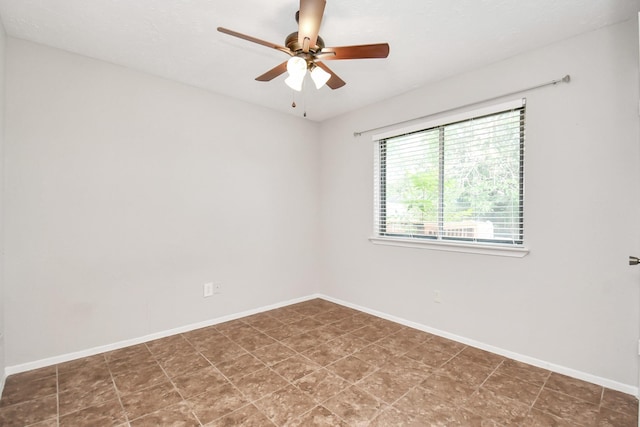 unfurnished room with ceiling fan