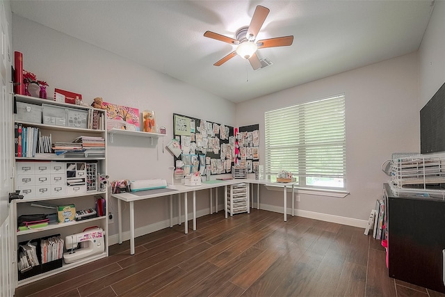 office space with ceiling fan and dark wood-type flooring