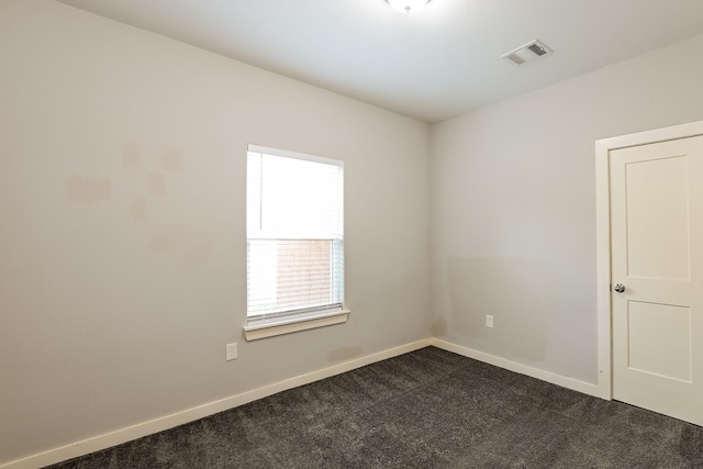 spare room featuring carpet flooring