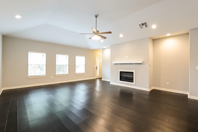 unfurnished living room featuring dark wood-type flooring, ceiling fan, and lofted ceiling