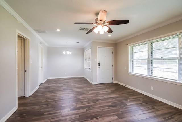 interior space with ceiling fan with notable chandelier, dark hardwood / wood-style flooring, and crown molding