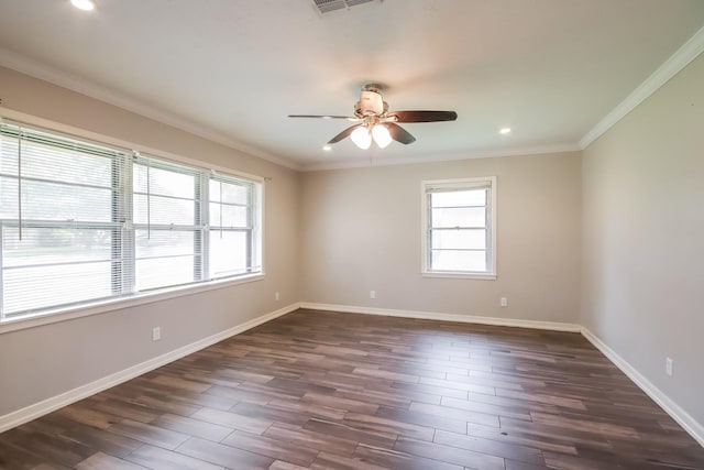 spare room with ceiling fan and crown molding