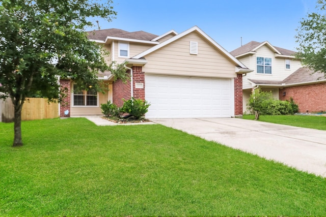 view of front of property with a garage and a front lawn