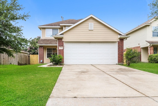 view of front of home featuring a front lawn and a garage