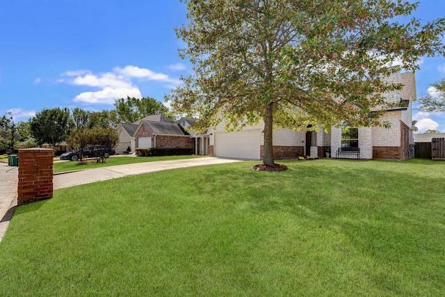 view of front of property featuring a garage and a front lawn