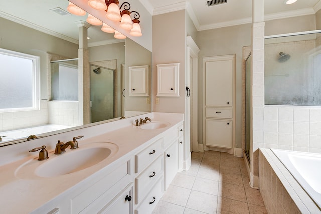 bathroom featuring vanity, shower with separate bathtub, ornamental molding, and tile patterned floors