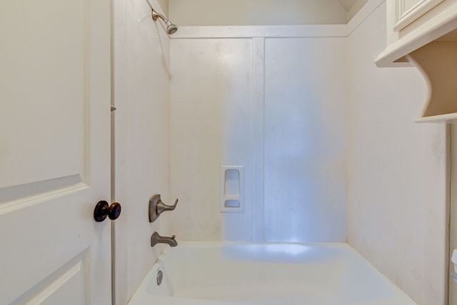 bathroom featuring washtub / shower combination