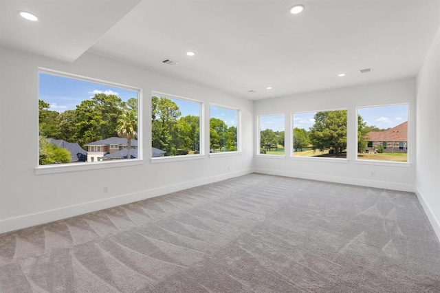 unfurnished sunroom with plenty of natural light