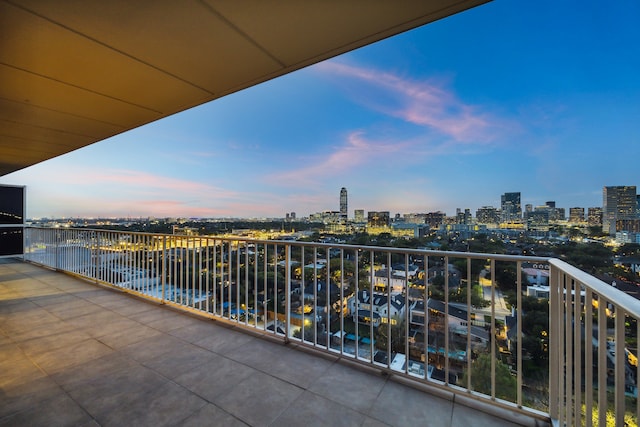 view of balcony at dusk