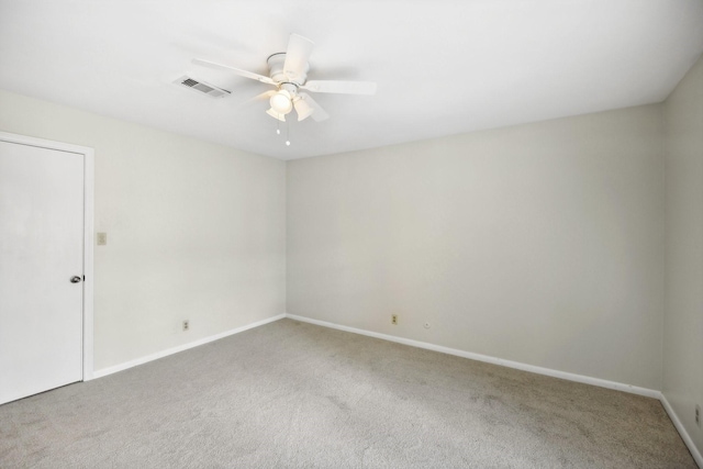 unfurnished room with carpet flooring and ceiling fan