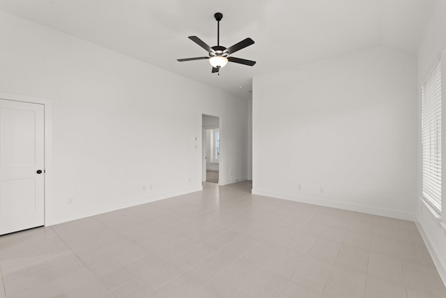 unfurnished room featuring ceiling fan and light tile patterned floors