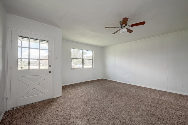 carpeted empty room with ceiling fan