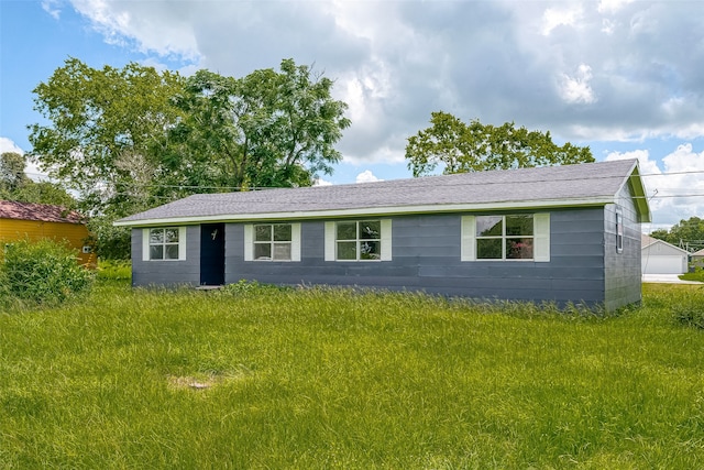 view of front of home with a front yard