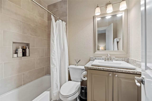 full bathroom with toilet, vanity, and shower / tub combo with curtain