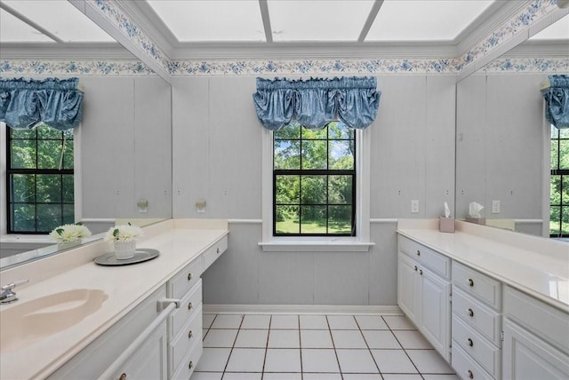 bathroom featuring tile patterned floors, vanity, and crown molding