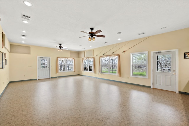 unfurnished room with ceiling fan