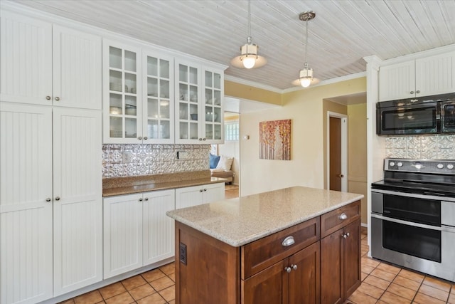 kitchen featuring a kitchen island, backsplash, crown molding, white cabinetry, and stainless steel range with electric cooktop