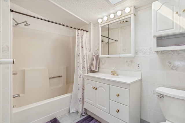 full bathroom featuring tile walls, toilet, tile flooring, shower / bath combo, and a textured ceiling