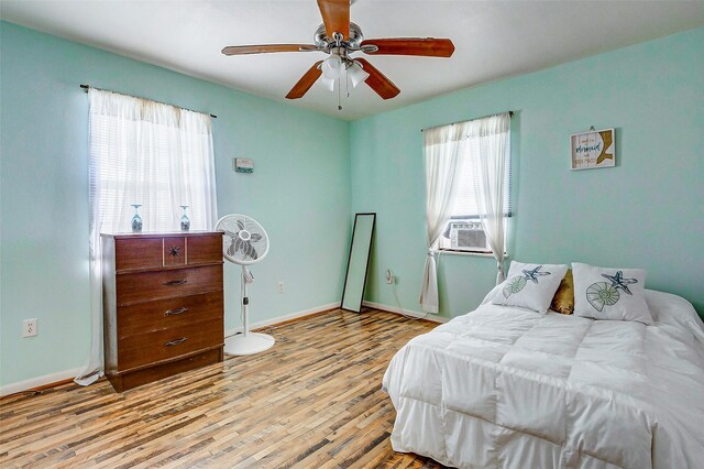 bedroom featuring ceiling fan and light wood-type flooring