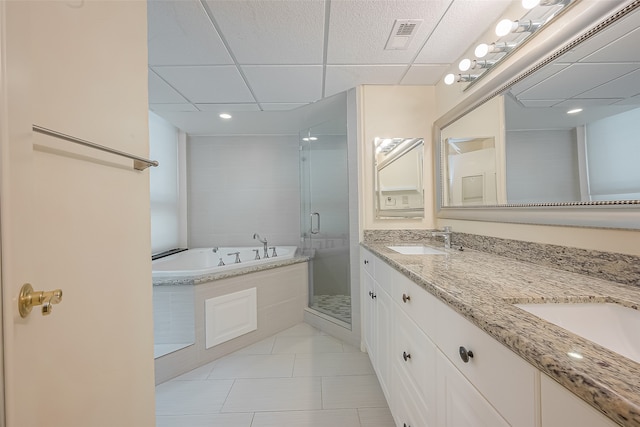 bathroom featuring vanity, separate shower and tub, and tile patterned floors