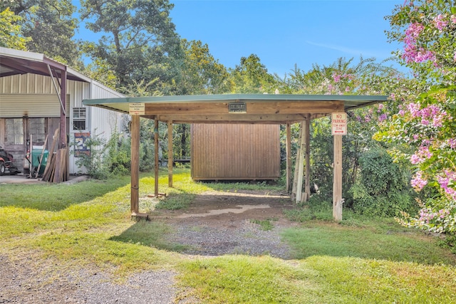 view of yard with a carport