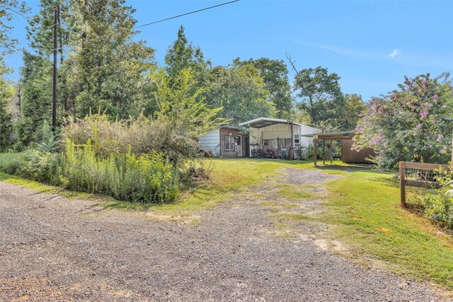 exterior space featuring a carport