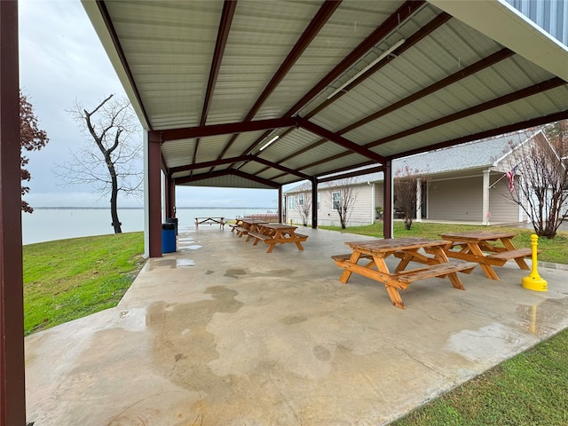 view of patio / terrace with a gazebo and a water view