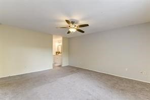 unfurnished room featuring carpet floors and ceiling fan