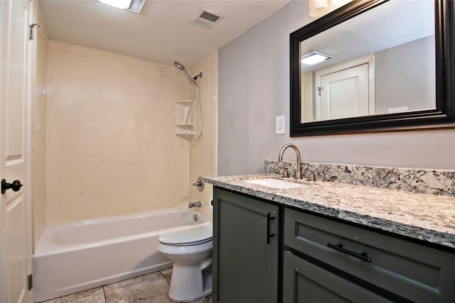 full bathroom featuring toilet, tile patterned floors, vanity, and bathing tub / shower combination