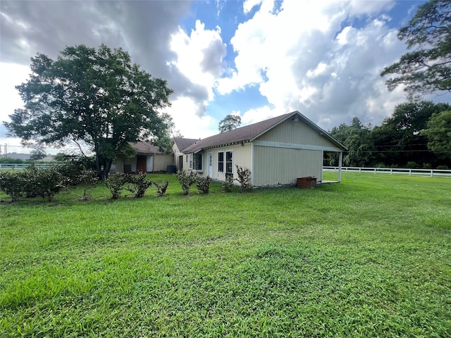 view of property exterior featuring a yard