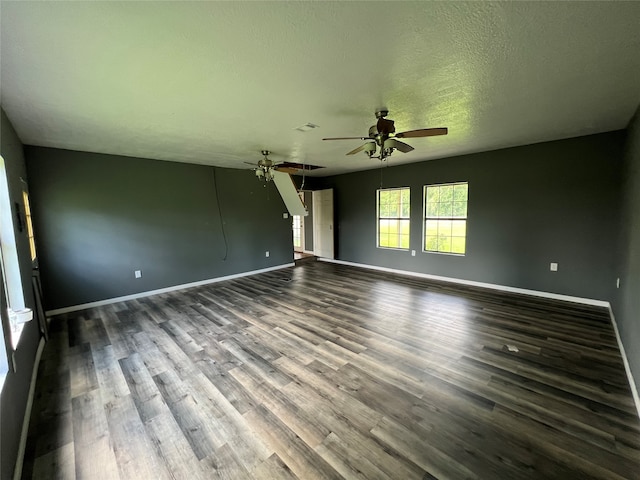 unfurnished room with a textured ceiling, ceiling fan, and hardwood / wood-style floors