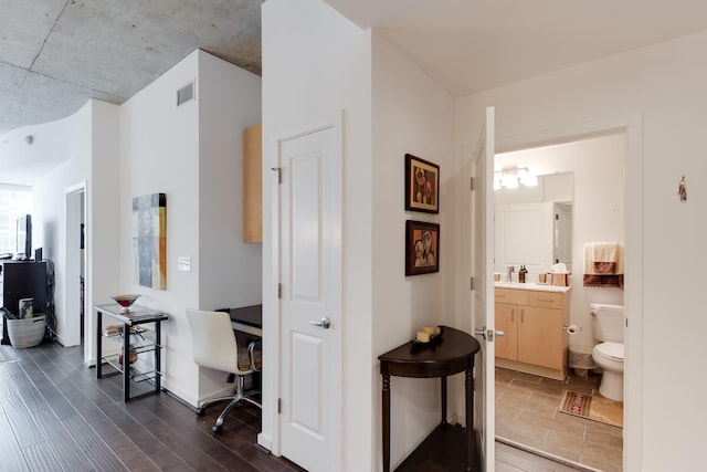 hallway featuring sink