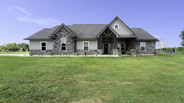 craftsman-style house with a front yard