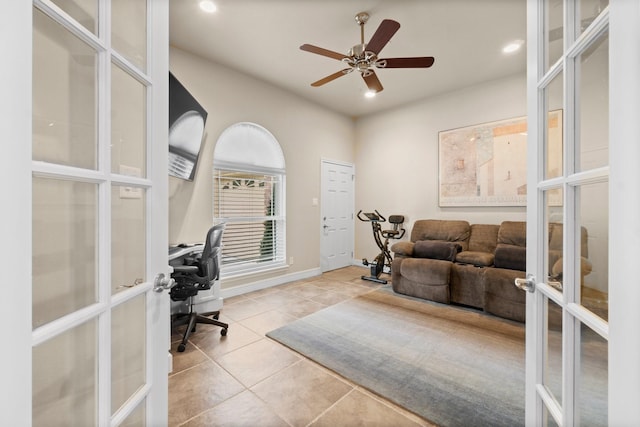 office area with ceiling fan, light tile patterned floors, and french doors