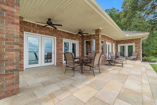 view of patio / terrace with ceiling fan and french doors