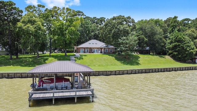 view of dock featuring a yard and a water view