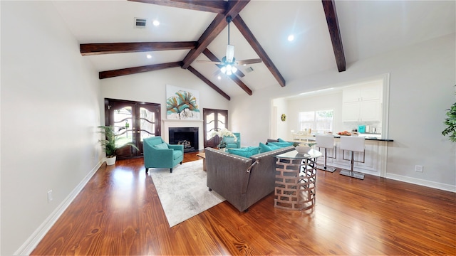 living room with high vaulted ceiling, beamed ceiling, ceiling fan, and wood-type flooring