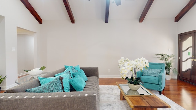 living room with wood-type flooring and lofted ceiling with beams