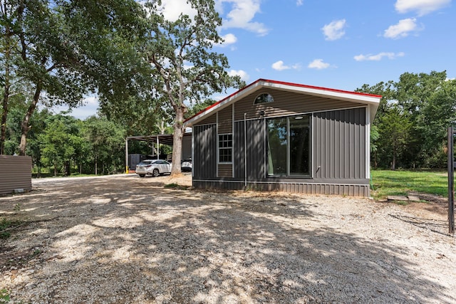 back of property with driveway