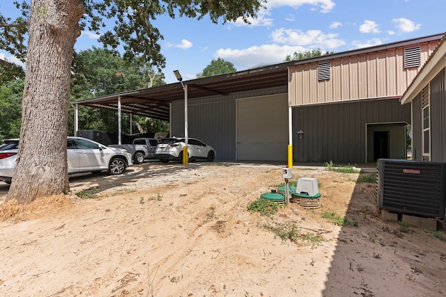 exterior space featuring central AC unit