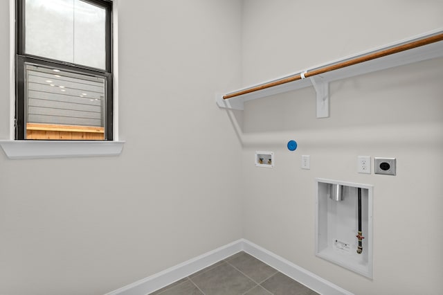 clothes washing area with tile patterned floors, hookup for a gas dryer, washer hookup, and hookup for an electric dryer