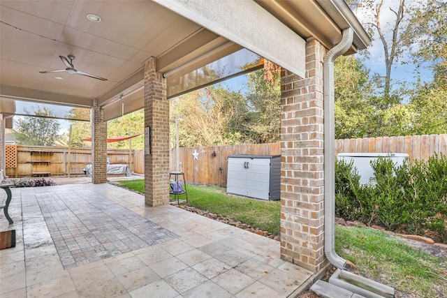 view of patio featuring ceiling fan and a fenced backyard