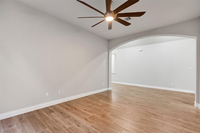 unfurnished room featuring ceiling fan and light hardwood / wood-style flooring