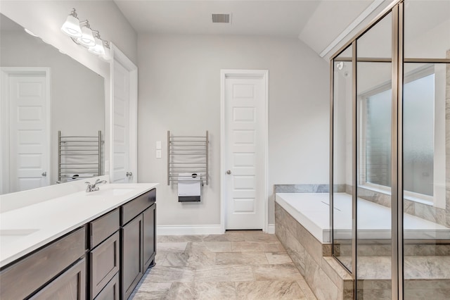 bathroom featuring vanity, separate shower and tub, lofted ceiling, and radiator