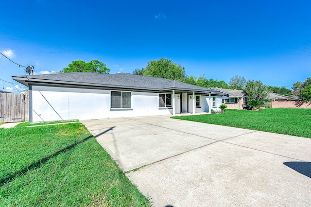 ranch-style house featuring a front yard