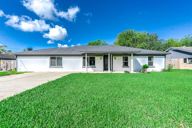 single story home with a front lawn