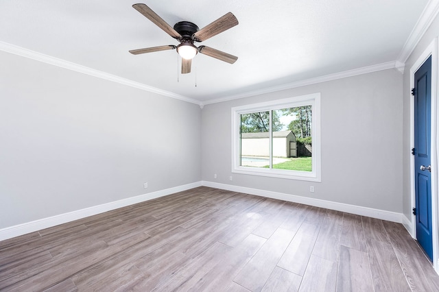 unfurnished room featuring crown molding, ceiling fan, and wood-type flooring