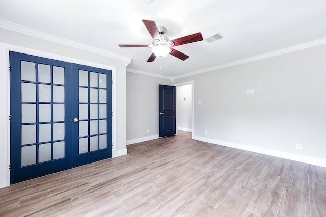 unfurnished room featuring crown molding, light hardwood / wood-style floors, french doors, and ceiling fan