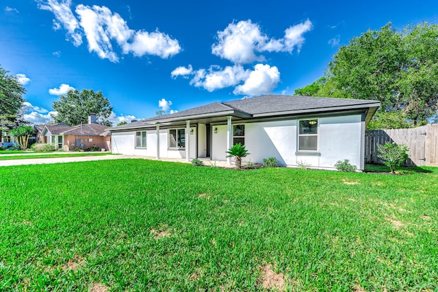 ranch-style home with a front yard