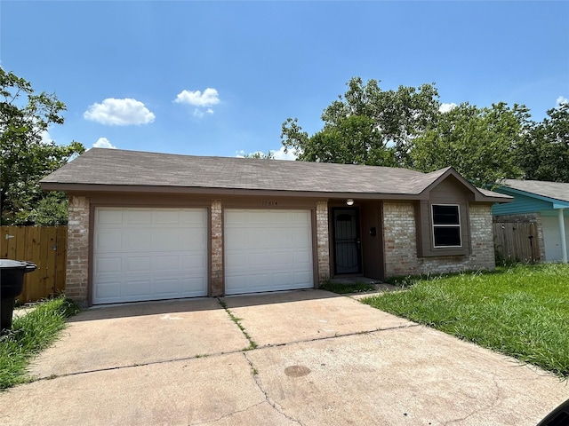 single story home featuring a garage